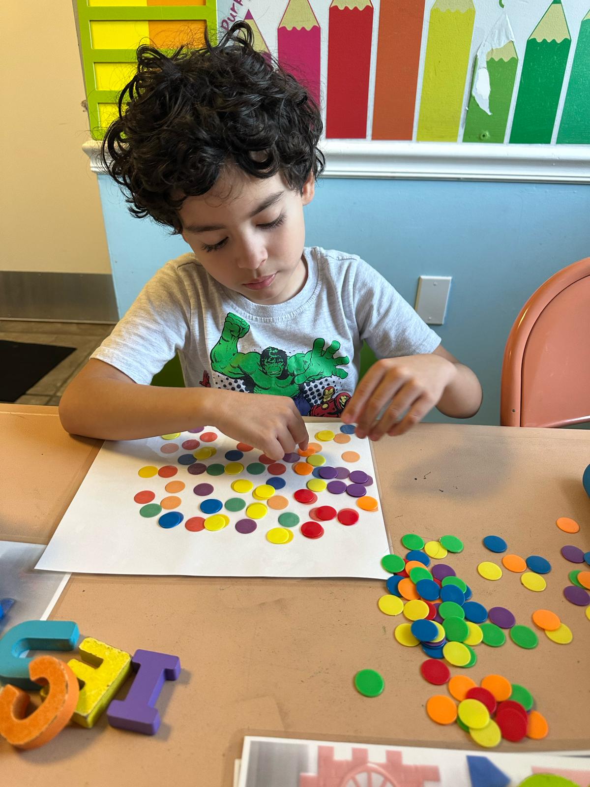 Student participating in an individualized hands-on learning activity at Bloom and Bridge Learning Program in Port St. Lucie
